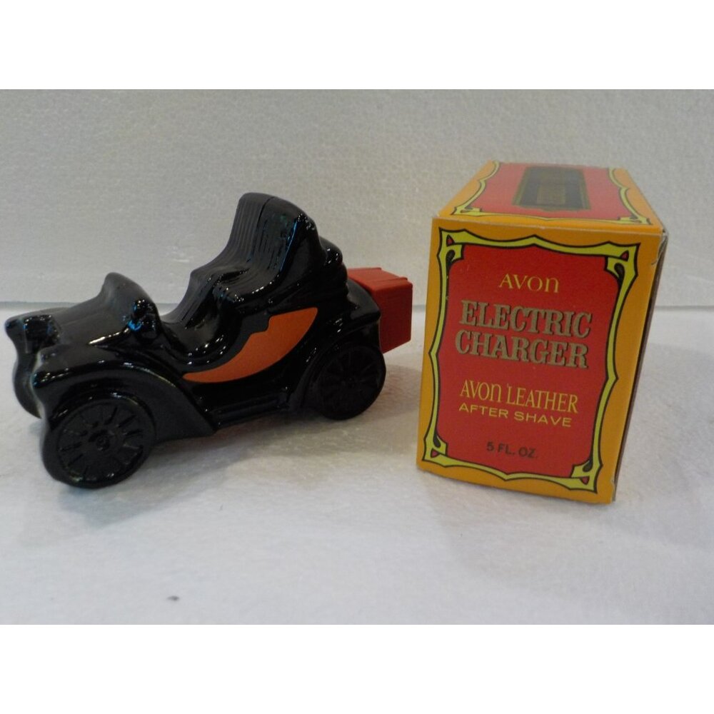 Vintage Avon Electric Charger After Shave Leather 5 oz Black Glass Car Bottle
